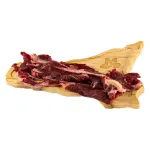 Fettine di Bovino MonteSoprano crude su tagliere di legno