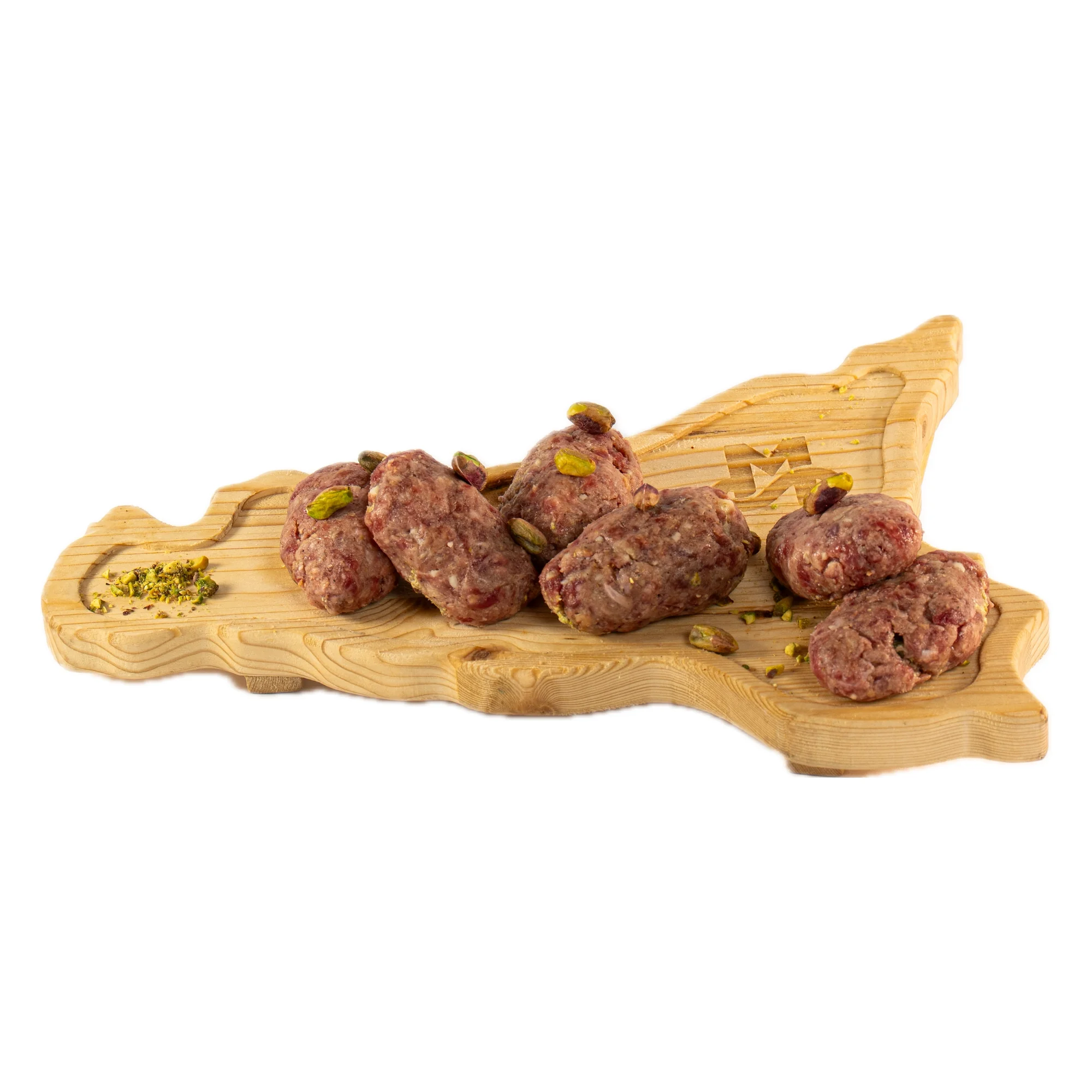 Polpette al pistacchio: Polpette crude al pistacchio MonteSoprano su tagliere di legno